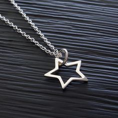 "Sterling Silver Star Pendant Outline Necklace, Patriotic Star Necklace, Celestial Zodiac Star Jewelry, Lucky Star Birthday Charm Necklace, FREE SHIPPING Brilliant and high polished, this 925 sterling silver star pendant necklace has a simple open work design. Choose from several chain options to make it special gift to give or a versatile accessory for yourself. OVERVIEW: * Beautiful, elegant, bright and sturdy 14, 16, 18, 20, or 22 inch 925 sterling silver chain. Choose from a 0.7 mm 925 sterl Silver Star-shaped Jewelry For Birthday Gift, Star Charm Necklace As Gift, Star Charm Necklace Gift, Star Charm Necklace For Gift, Silver Star-shaped Jewelry For Birthday, Silver Star-shaped Birthday Jewelry, Silver Star Shaped Jewelry For Birthday, Star-shaped Charm Necklace For Gift, Personalized Star Necklace For Birthday