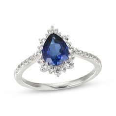 Elegant yet eye-catching, this lab-created gemstone ring is a beautiful surprise for her September birthday or just because. Crafted in sterling silver A pear-shaped blue lab-created sapphire is surrounded by white lab-created sapphires in varied sizes, creating a scalloped silhouette More white lab-created sapphires sparkle on the slender shank Fine Jewelry Teardrop Ring With Accent Stones, Pear-shaped Center Stone Promise Ring, Fine Jewelry Pear-shaped Sapphire, Fine Jewelry Pear-shaped Rings With Gemstone Accents, Pear-shaped White Gold Jewelry With Center Stone, Pear-shaped Rings With Gemstone Accents, Elegant Sterling Silver Pear-shaped Topaz Ring, Elegant Teardrop Topaz Ring In Sterling Silver, Fine Jewelry Sapphire Ring With Pear Shape