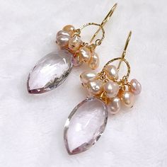 "Sophisticated dangle earrings featuring Pink amethyst & pink keshi Edison pearls. Gold filled findings. Genuine Pink amethyst marquise briolettes are 10x20mm. Handmade in Hawaii. Earrings total length is approximately 1.25\" including ear wires." Pink Briolette Earrings For Wedding, Pearl Briolette Earrings, Briolette Pearl Earrings With Gemstone For Wedding, Elegant Amethyst Earrings With Pearl Drop, Wedding Briolette Pearl Earrings With Gemstone, Elegant Pink Amethyst Earrings, Hawaii Earrings, Keshi Pearl Earrings, Edison Pearls