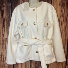 Nwt. No Flaws. Super Warm And Thick! Pretty Ivory Shade. Four Pickets On Front. Two Chest Pockets Button. Two Lower Pockets Open. Pretty Gold Buttons. Elevate Your Winter Wardrobe With This Stylish Joie Ivory Jacket. The Short, Button-Up Jacket Comes With A Tie Belt That Cinches At The Waist For A Flattering Silhouette. Its Long Sleeves And Belted Feature Make It Perfect For Winter, Fall, And Spring Seasons. The Jacket Is Made Of 100% Polyester, And It Is Dry Clean Only. In Addition To Its Pract Chic Cream Button-up Outerwear, Chic Winter White Outerwear With Button Closure, Chic Winter White Button-up Outerwear, Off White Blazer For Fall Workwear, Off White Blazer For Workwear In Fall, Chic White Outerwear With Button Closure, Chic Off White Outerwear For Work, Chic Off White Fall Blazer, Chic Off-white Fall Blazer