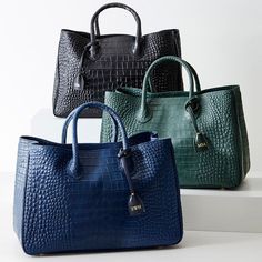 Handcrafted in Italy from gorgeous croc-embossed leather, our iconic Elisabetta's classic is timeless and elegant. The thoughtful construction features two internal zippered sections and two open compartments so you can organize all of your daily essentials. Add a subtle foil debossed monogram to make it yours.    10" h x 15.25" w x 8" d  Croc-embossed Italian leather.  Clean with a soft cloth.  Made in Italy.  Monogramming is foil debossed. Travel Tech Organizer, Kitchen Sanctuary, Is It Friday, Personalized Purse, It Friday, Leather Planner, Friday Favorites, Mark And Graham, Croc Leather