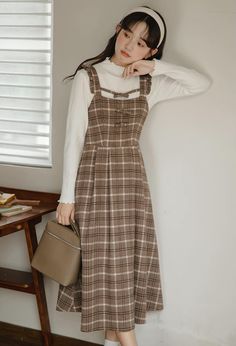 Tweed plaid pinafore dress with flutter straps, little bows down the chest and a midi skirt. Concealed back zipper. S: 33" chest, 26.5" waist, 42" lengthM: 34.5" chest, 28" waist, 42" lengthL: 36" chest, 29.5" waist, 42.5" lengthXL: 37.5" chest, 31" waist, 42.5" length Pinafore Dress, Overall Dress, Sweater Blouse, Cami Dress, Cardigan Jacket, Jeans Pants, Cocoa, Sweaters & Cardigans, Midi Skirt