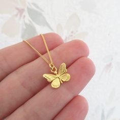 necklace with butterfly pendant on curb chain material: 24 K gold plated on 925/1000 silver pendant dimensions: 1.3 x 1 cm chain width: 1 mm 3 lengths to choose from: * 40cm (= 15.7") * 45cm (= 17.7") * 50cm (= 19.7") average weight: 2.00 gr punched item shipping within 24 hours Jewelry Accessories Ideas, Butterfly Pendant Necklace, Average Weight, Enamel Jewelry, Butterfly Pendant, Simple Necklace, Schmuck Design, Curb Chain, Moda Casual