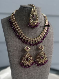 This exquisite Purple Golden antique Finish Beads necklace set with maangtikka is a must-have for any jewelry collection. The elegant purple and gold color combination exudes sophistication, while the antique finish adds a touch of vintage charm. Perfect for any special occasion, this set will surely make you stand out in a crowd. Add this stunning set to your wardrobe for a timeless and classy look. Gold Color Combination, Antique Finish, Beads Necklace, How To Look Classy, Color Combination, Vintage Charms, Necklace Set, Gold Color, Jewelry Collection