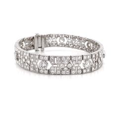 This is a beautiful retro inspired diamond link platinum bracelet. Covered by splendid round cut white natural diamonds 10.21 ct in total. Diamonds are all natural in G-H Color Clarity VS. Platinum 950 metal. Length: 17.4 cm Width. 1 cm Weight: 31 g Platinum Bracelet, White Gold Bracelet, 18k Gold Jewelry, Crown Jewels, White Diamonds, Retro Inspired, Diamond White, Link Bracelets, Precious Stones