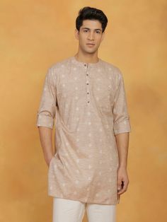 VASTRAMAY Men's Beige Cotton Kurta This classic beige kurta is crafted from comfortable cotton, perfect for everyday wear. Featuring a mandarin collar, long sleeves, and a straight hem with side slits, it offers a timeless and elegant look. Key Features Mandarin collar Long sleeves Straight hem with side slits Comfortable cotton material Specifications Sleeve Length: Long Top Length: Knee Length Material & Care Material: Cotton Care: Dry clean Legal Disclaimer: The product is guaranteed to be 10 Beige Kurta, Cotton Kurta, Mandarin Collar, Long Tops, Cotton Material, Knee Length, Everyday Wear, Dry Clean, Long Sleeves