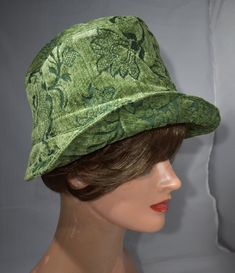 "aI made this  hat  from high end jacquard cotton and rayon chenille fabric of good construction. This hat measures 25 5/8 inches in circumference and is a size Xlarge.My hats look good on all types of hair styles.   Some people wear the hats and headbands high on their head and above the ears; others wear them low on the head and over the tips of the ears. They look great both ways.  21 ½\" - < 22 ½\" is small  22 ½\" - <23 ½\" is medium  23 ½ - <25 is large Measure your head:   Use a tape measure to determine the length, or size in inches. Place the   tape around your head about 1/8\" above your ear, across the mid-forehead, completely circling your head. You may want to measure a little bit over your ear if there is a deeper crown to the hat, or if you are wanting to keep your ears warm Green Cotton Hat With Short Brim, Green Cotton Cap Hat, Green Cotton Cap, Green Short Brim Sun Hat For Kentucky Derby, Green Cotton Hat One Size Fits Most, Green Sun Hat With Curved Brim, Green Flat Brim Hat, One Size Fits Most, Green Sun Hat With Flat Brim, Green Cotton Spring Hat