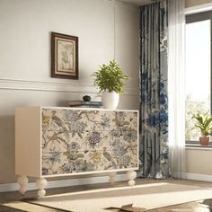 a living room scene with focus on the sideboard