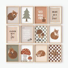 a set of nine framed pictures with woodland animals and trees on them, all in different shapes and sizes