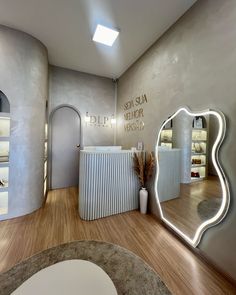 the inside of a shoe store with large mirrors