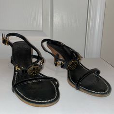 Size 7 Dust Bag Included Never Worn Black, Gold, And Wooden Heel Black Open Toe Heels With Gold-tone Hardware, Formal Black Sandals With Gold-tone Hardware, Black Leather Sandals With Gold-tone Hardware, Wooden Heel, Tory Burch Shoes, Wearing Black, Shoes Women Heels, Tory Burch, Dust Bag