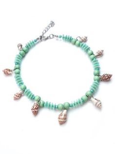 This ankle chain is handcrafted with wooden beads, seed beads, sequins with shell beads. The anklet is available in the colours orange, sea green, blue and pink. The ankle bracelet closes with a silver-coloured lobster claw clasp. Length anklet 10.6 - 12.2 inches (27-31 cm). All jewelry are handmade and designed in a limited edition. This creates an ever-changing collection that effortlessly respond to the latest fashion trends. The prices include shipping (in the Netherlands) and gift wrapping. Do you want the jewelry shown in a different color or length or have any other questions, please feel free to contact me. www.perelle.nl  www.facebook.com/perelle.nl Beaded Shell Anklets For Beach, Shell Necklace With Wooden Beads For Beach, Wooden Beads Shell Necklace For Beach, Beach Shell Necklace With Round Wooden Beads, Ocean-inspired Beaded Anklets For Summer, Summer Ocean-inspired Beaded Anklets, Handmade Shell Strand Anklets, Adjustable Beaded Bracelets With Dangling Beads For Beach, Black Friendship Bracelet