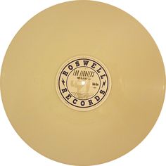 a yellow frisbee with the words rosweler records printed on it