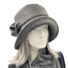 HANDMADE IN THE USA The lovely Eleanor. A super easy to wear, washable, and packable winter cloche. A practical and comfortable go-to hat for all women. Simply stylish in design and very reminiscent of those worn in the 1920s. This lovely flapper hat sits low on the head, covering the ears, and it has a wider equal width brim that can be tipped up or left down depending on how you feel. This couture hat is shown here made with warm fleece fabric and is available in several color options. A cozy Luxury Chic Adjustable Cloche Hat, Cheap One Size Fits Most Hats As Gifts, Luxury Wool Cloche Hat For Formal Occasions, Cheap One Size Fits Most Hats For Gifts, Bespoke Hats, Cloche Hats, Fleece Hats, Flapper Hat, Couture Hats