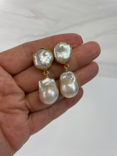 Gorgoeus baroque pearl earrings!  The actual pair on the listing has been sold. This is custom ordered.  This handmade Baroque Pearl earrings is classic and elegant.  The Baroque or flameball cultured freshwater dangling pearls are large 14mm to 15mm x 20mm to 21mm,  white, lustrous, AAA quality, attached to a gold filled bail/peg.  The ear finding is a beautiful 22k gold plated freshwater baroque Pearl, bezeled, brass body. Comes with large ear nuts.    Just simply gorgeous, great for weddings, Elegant Baroque Pearl Earrings With Pearl Chain, Elegant Baroque Pearl Chain Earrings, Pearl White Baroque Pearl Drop Bridal Earrings, Pearl White Bridal Earrings With Baroque Pearl Drop, Formal Baroque Pearl Chain Earrings, Baroque Pearl Drop Earrings In Pear Shape, Baroque Pearl Drop Earrings In White, Pearl Drop Earrings With Baroque Pearls, Baroque Pearl Pendant Earrings Gift