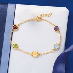 Ross-Simons - 5.50ct t. w. Multi-Gemstone Station Bracelet Over Sterling. 7". Wear a rainbow on your wrist with this 5.50 ct. t. w. multi-gemstone station bracelet. It appeals to the eye and calls to the heart with its stream of citrine, amethyst, peridot, blue topaz and garnet gemstones in varying shapes on an 18kt yellow gold over sterling silver cable chain. Includes a 1" extender. Springring clasp, multi-gemstone station bracelet. Elegant Multicolor Birthstone Bracelets, Elegant Multicolor Birthstone Bracelet, Yellow Gold Multi-stone Bracelet Gift, Multicolor Multi-stone Gold Bracelet As Gift, Elegant Multi-stone Gold Bracelet Gift, Fine Jewelry Multi-stone Bracelet As Gift, Multi-stone Round Gold Bracelet As Gift, Gold Multi-stone Bracelet As Gift, Fine Jewelry Multi-stone Bracelets For Gifts