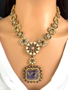 Purple Victorian Doublet Moissanite Polki Necklace, Sabyasachi Inspired Necklace, Celebrity Designer Necklace, Indian Pakistani Jewelry Necklace Length 20 inches approx with a chain closure Earrings length approx 1.5 inches Width 1.25 inch Regular Size And Adjustable Ships from California, USA Delivery in 2-5 business days in the USA. Other designs can be found here https://www.etsy.com/listing/1381240765/premium-quality-gold-plated-silver?click_key=e1a9e46c1ba3dcb2d7ddeb00610b709b7497bd62%3A1381240765&click_sum=5b5797e9&ref=shop_home_active_511&pro=1&frs=1&sts=1 https://www.etsy.com/listing/1266279586/premium-quality-gold-plated-silver?click_key=ac3f9678a67e3cb7b0f157cdf3d63e11bd1206cf%3A1266279586&click_sum=258e6572&ref=shop_home_active_20&pro=1&frs=1&sts=1 https://www.etsy.com/listing/1 Polki Necklace, Necklace Indian, San Ramon, Designer Necklace, Inspired Necklace, Pakistani Jewelry, Celebrity Design, Marble Stone, Marble Stones