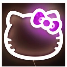 an image of a neon hello kitty sign with purple lights on the front and side