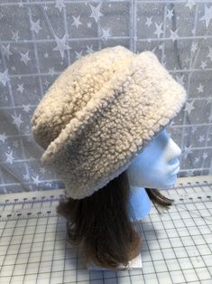 I made this warm pillbox style hat out of ivory Berber fleece for warmth and comfort. The body of the hat is ivory Berber and the hat is lined with fleece. The hat is a double layer of fabric for extra warmth and comfort. It's sized to fit most adults 22-23 inches around head. It has a nice soft feel and is completely machine washable and dryable. A great travel hat. Also available in black, charcoal, creamy white, camel or light gray. The photos are of the ivory hat. Last picture shows color di Ivory Pillbox Hat, Sherpa Hat, Christmas Party Hats, Rich Girl Fashion, Earflap Beanie, Fleece Hats, Ear Flap Hats, Santa Costume, Travel Hat