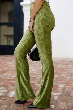 Get in the groove of things this season with our Stevie High Waisted Green Pants! Featuring a soft cord material, a high waist, center seams down the front and back of pant legs, a wide leg fit, and an elastic waistband. Style these pants with our Tiana Topto complete the look! Stretch High Waist Corduroy Pants, Green Full-length Corduroy Bottoms, Green Corduroy Full-length Bottoms, Full Length Green Corduroy Bottoms, Green Full-length Corduroy Pants, Green Full Length Corduroy Pants, Non-stretch Corduroy Pants, Solid Non-stretch Corduroy Pants, Chic High-waisted Corduroy Pants