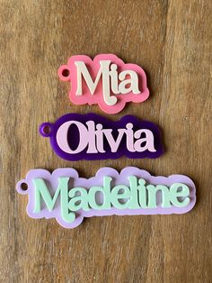 "Over 30 colors to choose from!! This listing is for a single bag tag/keychain. Perfect for backpacks, diaper bags and more!  Includes keychain cable. Keychain is cut from 1/8\" layers of acrylic and layered together. Font is retro style as shown in photos. Each keychain varies in length depending on name. Each is about 2-4\" long. See drop down menu for colors available for backing layer and name.  Please leave single name in personalization box." Customized Pink Keychains, Playful Pink Keychains For School, Cute Pink Keychain For Personalized Gift, Cute Pink Personalized Gift Keychains, Custom Name Pink Keychains For School, Cute Personalized Multicolor Keychains, Personalized Pink Keychains For Personal Use, White Custom Name Keychains For Personalized Gift, Personalized Fun Keychains