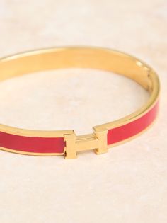 Embrace timeless elegance with this delicate gold bangle with red filled enamel. This bracelet will make a cherished addition to your everyday style. Floral Shop, Gold Bangle, Gift Card Shop, Altar'd State, Gold Bangles, Everyday Style, Bangle Bracelet, Red Gold, Everyday Fashion