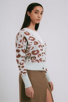 The Pepa Cardigan has knitted tricolor leopard spots. This crew neck long sleeve sweater offers a relaxed fit suitable for any occasion. Pair it effortlessly with pants or shorts. 57% acrylic, 29% polyamide, 7% wool, 7% viscose; buttons Made in Italy One size Hand wash Leopard Spots, Cardigan Sweaters For Women, Womens Cardigan, Tri Color, Sleeve Sweater, Cardigan Sweater, Long Sleeve Sweater, Sweater Cardigan, Long Sleeve Blouse