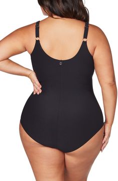 Stay comfortably and stylishly covered in this one-piece swimsuit designed with a crossover neck, molded cups, and a powermesh lining for beachside support. The fully adjustable straps allow you to customize for a perfect fit. Powermesh lining Full back coverage 82% recycled nylon, 18% spandex Hand wash, dry flat Imported This product meets Nordstrom Sustainably Sourced Materials criteria: contains at least 50% sustainably sourced materials Black Underwire Bodysuit For Pool, One-piece Shapewear Swimwear, One-piece Smoothing Shapewear Swimwear, Smoothing Shapewear Style One-piece Swimwear, One-piece Shapewear Swimwear With Smoothing Detail, Solid One-piece Shapewear Swimwear, Black Shapewear Swimwear For Swimming, Shapewear Tankini For Swimming, Black Shapewear Swimwear For Pool