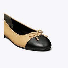 A classic ballet flat crafted in fine leather is finished with a contrast cap-toe and embellished with a bow. A subtle Double T initiates the elegant style as a new brand signature. Comfortable Ballet Flats, Designer Flats, Mule Sandals, Footwear Design Women, Ballet Flat, Leather Working, Elegant Style, Ballet Flats, Ballet Shoes