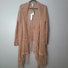 Nwt Chico's Tan Crocheted Traveler's Boho Fringe Hem Cardigan Size: 3 (Xl - 16) When Flat: Length: 41" (Shoulder To Fringe) Pit To Pit: 20" Sleeve: 24" - Boho Crocheted Cardigan - Fringe Hem And Open Front Style - Beautiful Sleeve Cuff And Large Panel Pattern - Perfect Condition, Never Worn Open To Offers/Bundle Discounts! Smoke-Free Home Ships Same/Next Day! Beige Winter Outerwear For Festivals, Fringe Long Sleeve Cardigan For Festivals, Spring Fringe Long Sleeve Cardigan, Long Sleeve Open Knit Sweater For Festival, Spring Long Sleeve Fringe Cardigan, Fitted Beige Outerwear For Festivals, Bohemian Open Knit Long Sleeve Outerwear, Bohemian Long Sleeve Open Knit Outerwear, One Size Long Sleeve Cardigan With Fringe