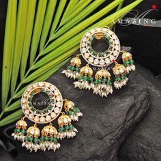 Silver Moissanite Polki with Green Chip & Pearls Earring ,Moissanite Polki Earring, Jhumka, Bridal Jewelry, Silver Jhumkas ,Wedding Jhumki Material : Silver Gemstone: Moissanite, Enamel and Fresh Water Sea Pearls Stone colour: Uncut Polki Primary colour: Gold Size-Length:50mm Width: 40mm Closure : Screw back and Clips Silver Intricate, hand crafted, Pure Silver Polki Jhumka, studded with high quality Moissanite ,Emerald chip and Fresh Water Sea Pearls Earring comes with screw back and clips, mad Fusion Style Wedding Danglers With Cutdana, Fusion Style Cutdana Danglers For Wedding, Fusion Style Bridal Earrings With Cutdana For Diwali, Fusion Bridal Earrings With Cutdana For Diwali, Fusion Meenakari Jhumkas For Wedding, Heavy Fusion Jhumkas For Wedding, Fusion Style Meenakari Bridal Earrings For Reception, Fusion Style Jhumkas For Festive Reception, Fusion Style Wedding Jhumkas With Latkans