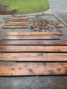 several pieces of wood laying on the ground