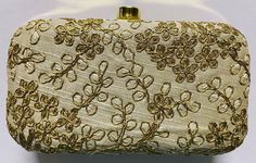 BRAND NEW, FROM New Delhi, INDIA--  no price tag though since they are purchased directly from manufacturer. I am the only USA-based seller for these purses on Ebay! Dupioni Silk fabric with metallic golden thread/silk thread embroidery on both sides! Very regal, rich look!! Crystals closure CLASP.  36- 40" inches chain/  removable. Both sides are the same Pattern. Approximate measurement is width 7"x height 4" (inches)Lined with matching satin fabric inside, no pockets.  Minor imperfections may Designer Beige Box Bag For Gift, Festive Beige Rectangular Evening Bag, Designer Gold Box Bag, Gold Embroidered Rectangular Evening Bag, Beige Clutch Box Bag As Gift, Festive Gold Rectangular Clutch, Gold Embroidered Evening Bag Gift, Gold Rectangular Clutch For Festive Occasions, Cream Rectangular Box Bag For Gifts