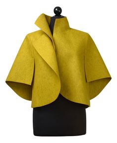 Wool Jacket - Dynamic proportions and crisp angles make this sculptural jacket an easy-to-wear statement piece. The artists unique arm awning sleeve design is open on bottom, providing both coverage and freedom of movement. Felted merino wool feels soft against the skin, yet is substantial enough to hold its shape for years of wear. Spring Merino Wool Outerwear For Work, Chic Merino Wool Outerwear For Work, Elegant Merino Wool Outerwear For Spring, Modern Merino Wool Outerwear For Fall, Chic Fitted Merino Wool Outerwear, Structured Wool Outerwear For Spring, Modern Structured Cropped Jacket For Fall, Modern Wool Blazer For Spring, Modern Fitted Wool Outerwear