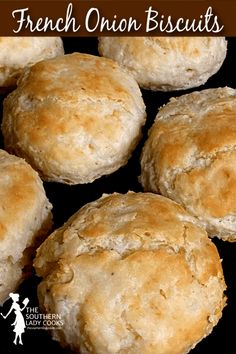 some biscuits that are sitting on a black surface with the words french onion biscuits