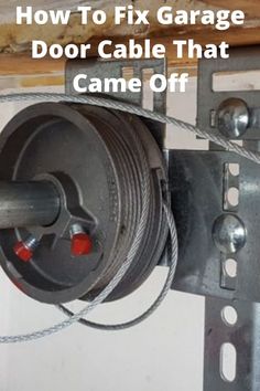 an overhead garage door cable that is connected to a wall mounted device with the words how to fix garage door cable that came off