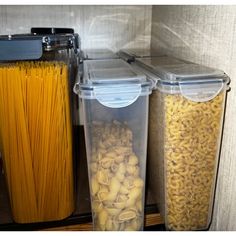 two plastic containers filled with food next to pasta and other items on a shelf in a kitchen