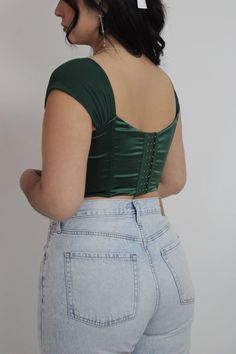 Make a statement with this off-the-shoulder satin corset top. Featuring a structured bodice and a sweetheart neckline, this piece accentuates your curves for a flattering, feminine look. Satin Corset With Built-in Bra For Night Out, Fitted Strapless Off-shoulder Top For Party, Satin Crop Top With Boned Bodice For Party, Party Satin Crop Top With Boned Bodice, Off-shoulder Fitted Corset With Boned Bodice, Fitted Off-shoulder Corset With Boned Bodice, Elegant Overbust Crop Top For Party, Satin Tops With Boned Bodice For Night Out, Elegant Underbust Crop Top With Boned Bodice