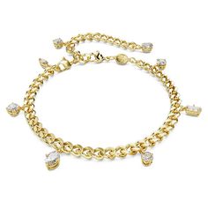 This Dextera design is a versatile piece. A removable extender transforms the bracelet into an anklet for extra styling options. The gold-tone plated design features a linked chain adorned with hanging crystals in various shapes and sizes, and a single Swarovski Zirconia on the elongation. Crafted with exquisite detail, it looks stunning worn either way. Elegant Metal Chain Bracelet With Dangling Charms, Adjustable Chain Dangle Bracelet, Gold Plated Dangle Chain Bracelet, Elegant Gold Crystal Anklets, Gold-tone Chain Charm Bracelet, Adjustable Gold Crystal Anklets, Metal Charm Bracelet With Dangling Charms, Gold Crystal Chain Bracelet, Cubic Zirconia Dangle Bracelets