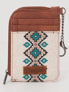 Southwestern art print on canvas Two credit card slot Zip-top closure, fabric lining Wrangler logo "W" on the back Attached split key ring Double round handle (drop: 5.75") 10.5" X 3.5" Western Christmas Wishlist, Western Birthday Gifts, Western Shopping, Western Things, Country Fits, Western Fits, Western Stuff, Cowgirl Accessories, Western Birthday