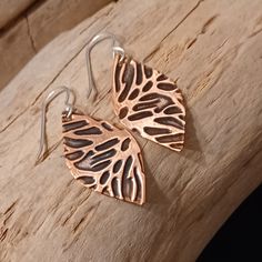 Handcrafted in my studio in Colorado, these lightweight copper earrings are embossed to add texture and are complete with sterling silver ear wire (for those sensitive ears). All of my earrings are made to order...no two earrings are ever completely alike (despite my best efforts!); therefore, your earrings may vary ever-so-slightly from the pictures.   PRODUCTION & SHIPPING  My goal is to have your earrings made and in the mail the following business day. All Teak+Copper packages ship via USPS First Class Mail (3-5 day shipping).  Priority Mail (2-3 day shipping) is available for an additional fee.  Please select your shipping option at checkout.  PACKAGING  If you would like for your earrings to come in a gift box, please select that option when checking out. Pattern Minimalist, 7th Anniversary Gifts, Embossed Metal, 7th Anniversary, Tree Pattern, Tree Patterns, Copper Earrings, Sensitive Ears, Ear Wire