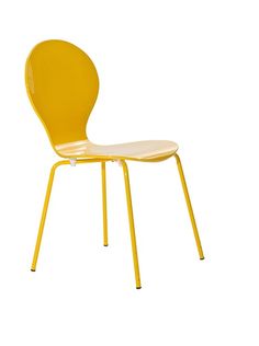 a yellow chair sitting on top of a white table