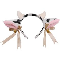 a cow headband with two ears and bows on the front, one has a pink bow