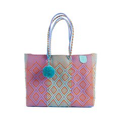 Meet your new favorite beach bag. This super flexible, water-resistant woven Super Tote is made using 100% recycled plastic to fit all your beach-day essentials with a spacious interior and comfortable handles for toting anywhere.  The Super Tote is the perfect size and style to carry everything you may need for a beach vacation including your towel, go-to book, sunnies, snacks, and as many sunscreens as you want.  Handmade with amor from ethically sourced high-quality materials, this bag will b Blue Shoulder Bag For Summer Market, Blue Summer Shoulder Bag, Blue Shoulder Bag For Summer, Blue Recyclable Travel Bags, Blue Summer Packable Bag, Blue Recyclable Beach Bag For Summer, Casual Multicolor Recyclable Bag, Multicolor Reusable Summer Bags, Blue Reusable Tote Beach Bag