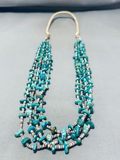 "MAKE US AN OFFER BY CLICKING THE \"MESSAGE SELLER\" Button- This is an astounding vintage Santo Domingo necklace. Mega amounts of turquoise stones are separated and accented with beautiful tan heishi in this 4-strand necklace! The largest of turquoise measures about ½\" x ¼\". The length of the necklace measures around 38\". Sturdy 88 grams. Make Us an Offer- Due to the high demand of our items, many pieces sell quite fast. The most frequent email we receive are from buyers who waited too long Vintage Green Beaded Turquoise Necklace, Green Turquoise Necklace With Round Beads In Vintage Style, Vintage Blue Turquoise Necklace Collectible, Collectible Vintage Blue Turquoise Necklace, Vintage Turquoise Necklace For Collectors, Vintage Adjustable Turquoise Beaded Necklace, Adjustable Vintage Turquoise Beaded Necklace, Vintage Adjustable Turquoise Beaded Necklaces, Southwestern Style Turquoise Necklace For Vintage Collection