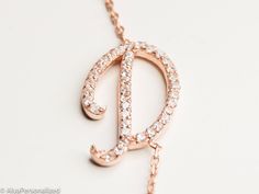 Diamond initial necklace with sparkly real diamonds...14k rose gold necklace which is very unique and personal as everyday necklace ♡ ► FEATURES; Gemstones: Real 1.1 mm diamonds (Color G; clarity VS) Material Options: 14K Rose Gold - 14K White Gold - 14K Yellow Gold Length : Standart length is 16''+0.5'' extention chain ❥ I can adjust necklace length to your demands, please add me a note during check out if you wish a different necklace length. ► HOW TO ORDER; Please select your preffered materi