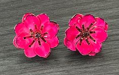 Beautiful vintage estate clip on earrings.  Pink enamel flowers, I believe is from the 1960's.  I don't have much information in them.  One looks slightly smaller than the other (see pics).  Buyer can try to adjust the petals if they choose. Recently attended the estate sale of a 98 year old women.  I was lucky enough to find some beautiful pieces that I will be offering in my shop.  This is one of them and I will be adding more beautiful pieces of jewelry from the same estate , please take a look.  Thank you! We are a Mom and Pop operation! We sell new & old, useful and odd and everything in-between. We keep our starting bids low and our descriptions fair and accurate. We aren't a store or website. We love finding and selling items that people can enjoy or repurpose.   Free Insured Shippi Vintage Clip-on Flower Earrings, Vintage Flower-shaped Clip-on Earrings, Vintage Flower Shaped Clip-on Earrings, Vintage Pink Earrings For Spring, Vintage Pink Flower-shaped Earrings, Pink Vintage Earrings For Spring, Vintage Flower Earrings For Spring, Anniversary Flower Clip-on Earrings, Anniversary Clip-on Flower Earrings