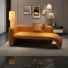 a modern living room with an orange couch