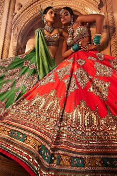 Crimson red attached cancan lehenga with Persian motifs and intricate hand embroidery with beads and sequins. Comes with padded, embroidered blouse and co-ordinated dupatta.
Components: 3
Type Of Work: Floral
Neckline: Sweetheart
Sleeve Type: Sleeveless
Fabric: Lehenga and Blouse: Raw Silk, Dupatta: Tissue Georgette
Color: Red
Other Details: 
Length:
Blouse: 14 inches
Lehenga: 44 inches
Model height: 5ft 8inches, wearing size S
Note: All the jewellery worn, bag held by the model and the green le Festive Red Sets With Motifs, Red Motif Saree For Reception, Red Saree With Motifs For Reception, Red Bollywood Lehenga With Motifs, Festive Red Choli With Motifs, Red Bohemian Floor-length Set, Red Traditional Drape Sets With Motifs, Red Festive Lehenga With Motifs, Red Choli With Motifs For Traditional Ceremonies