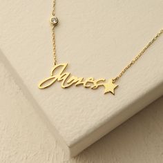 Looking for the perfect way to celebrate a special someone's birthday? Look no further than our Birthstone Name Necklace - the ultimate personalized gift that combines elegance, sentimentality, and style. The birthstone adds an extra touch of elegance and personalization, making it a truly special gift that your loved one will cherish forever. Whether you choose their birthstone or a stone that holds special meaning to them, this necklace is a beautiful and thoughtful way to show how much you ca Sterling Silver Name Necklace For Birthday Gift, White Gold Name Necklace For Birthday, Dainty Star-shaped Personalized Necklace, Dainty Personalized Star Necklace, Elegant Engraved Necklace For Birthday Gift, Elegant Customizable Necklace For Birthday Gift, Elegant Customizable Charm Necklaces For Birthday Gift, Customizable Elegant Birthstone Necklace For Mother's Day, Elegant Name Necklace For Birthday